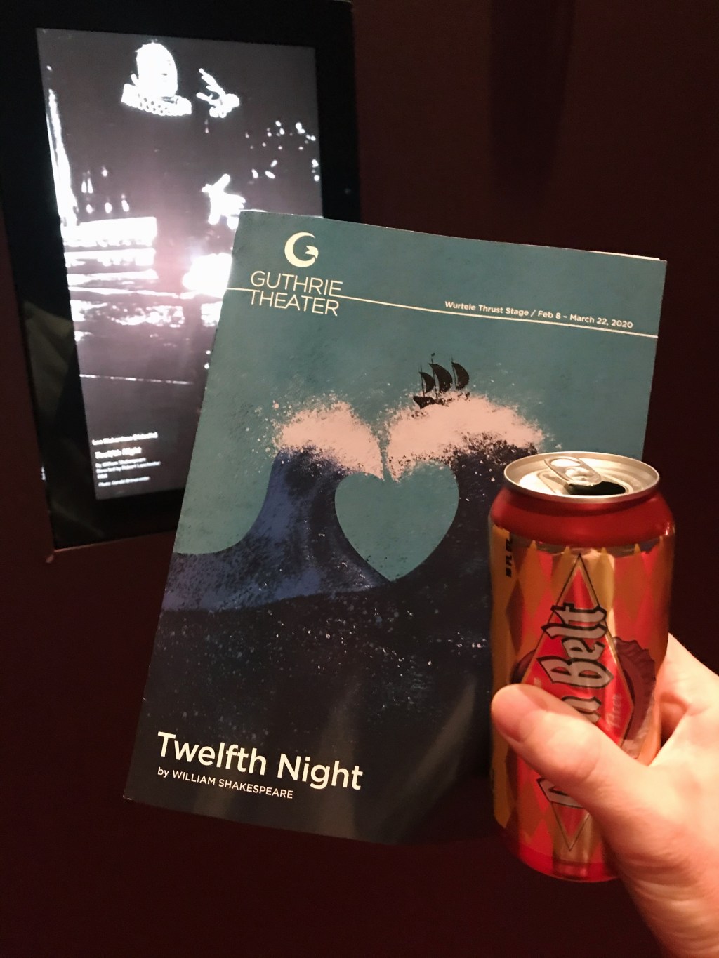 Theater program and can of beer