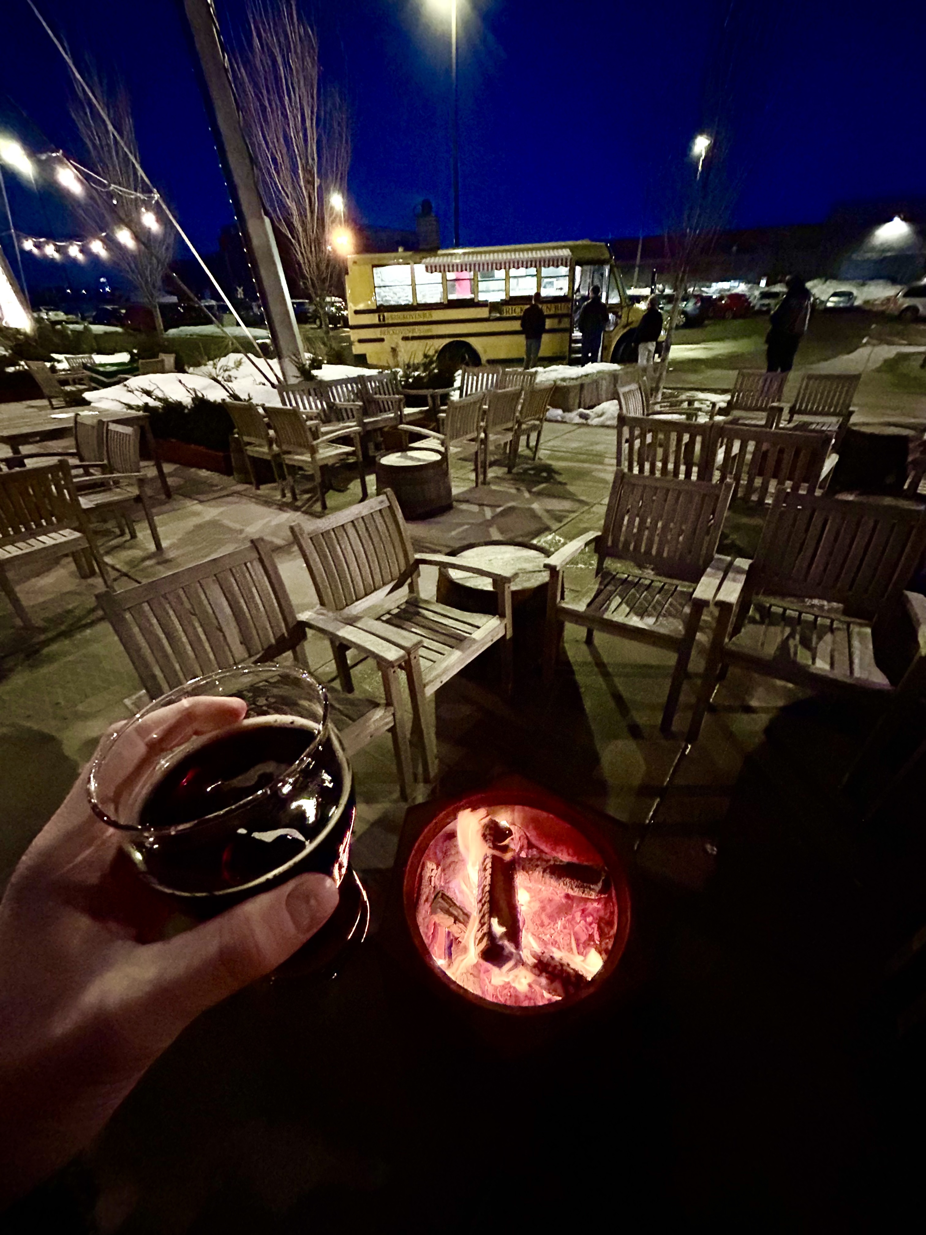 Enjoying the bonfire at Lake Monster Brewing Company in St. Paul with a beer in hand