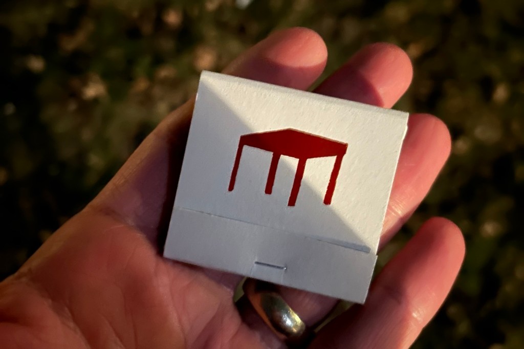 A matchbook in my hand featuring the TABLE/READ logo. The monthly theater series is put on in Minneapolis by Grant Sorenson.